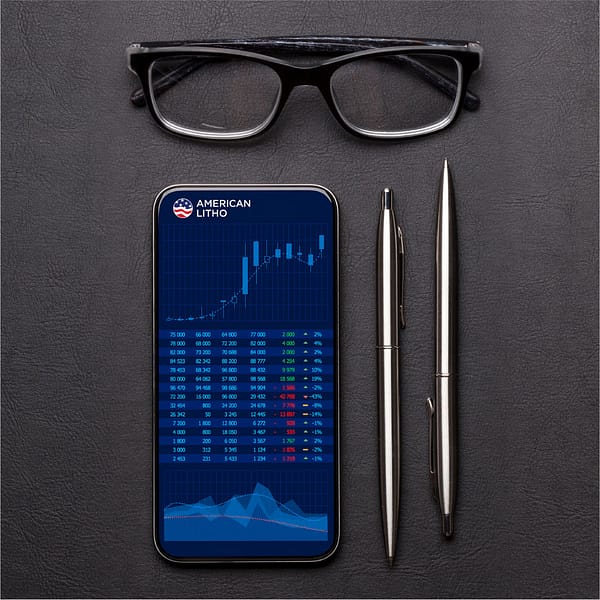 A smart phone with two pens and one a pair of black glasses