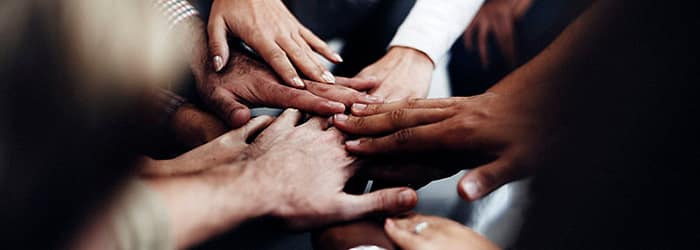 Joined hands for teamwork
